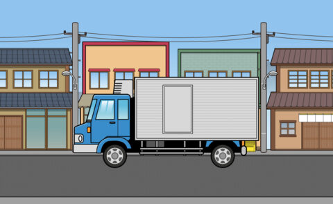 昭和の町並みを走るトラックのイラスト