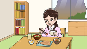 夕食で魚を食べる