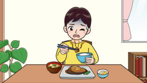 嫌いなものを食べる子供