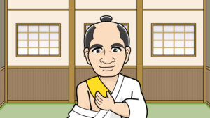 辛子のついた湿布を貼る