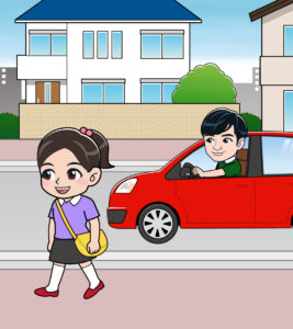 歩道を歩く女の子